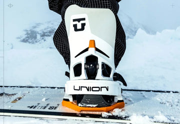 attacco snowboard automatico Union Atlas Step On vista frontale sulla neve