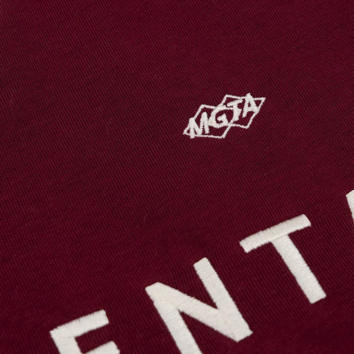 Magenta rimet burgundy polo shirt